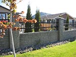 thumbnail of precast stone wall combined with rodiron fencing
